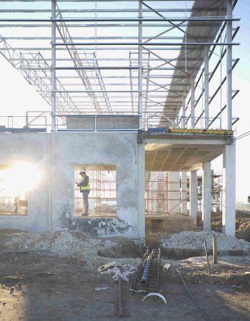 site-manager-checking-window-frame-on-construction